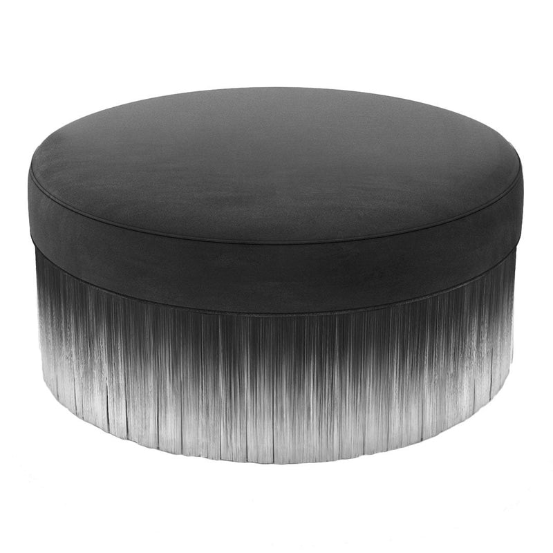 Black round ottoman with a stylish gradient fringe in gray tones, perfect for modern decor accents.