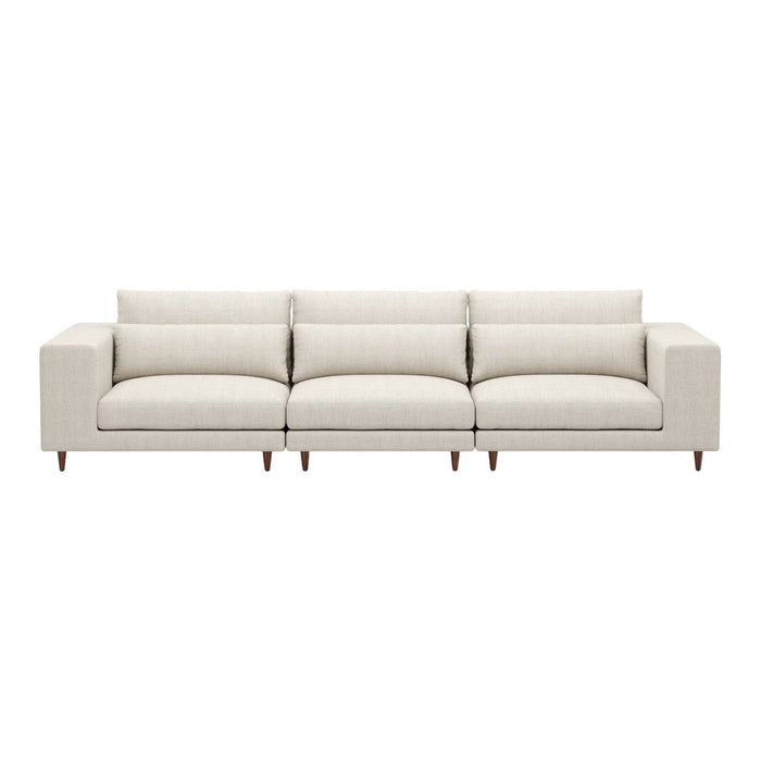 Light beige sofa with clean lines and soft cushioning, featuring a textured fabric and minimalist design.