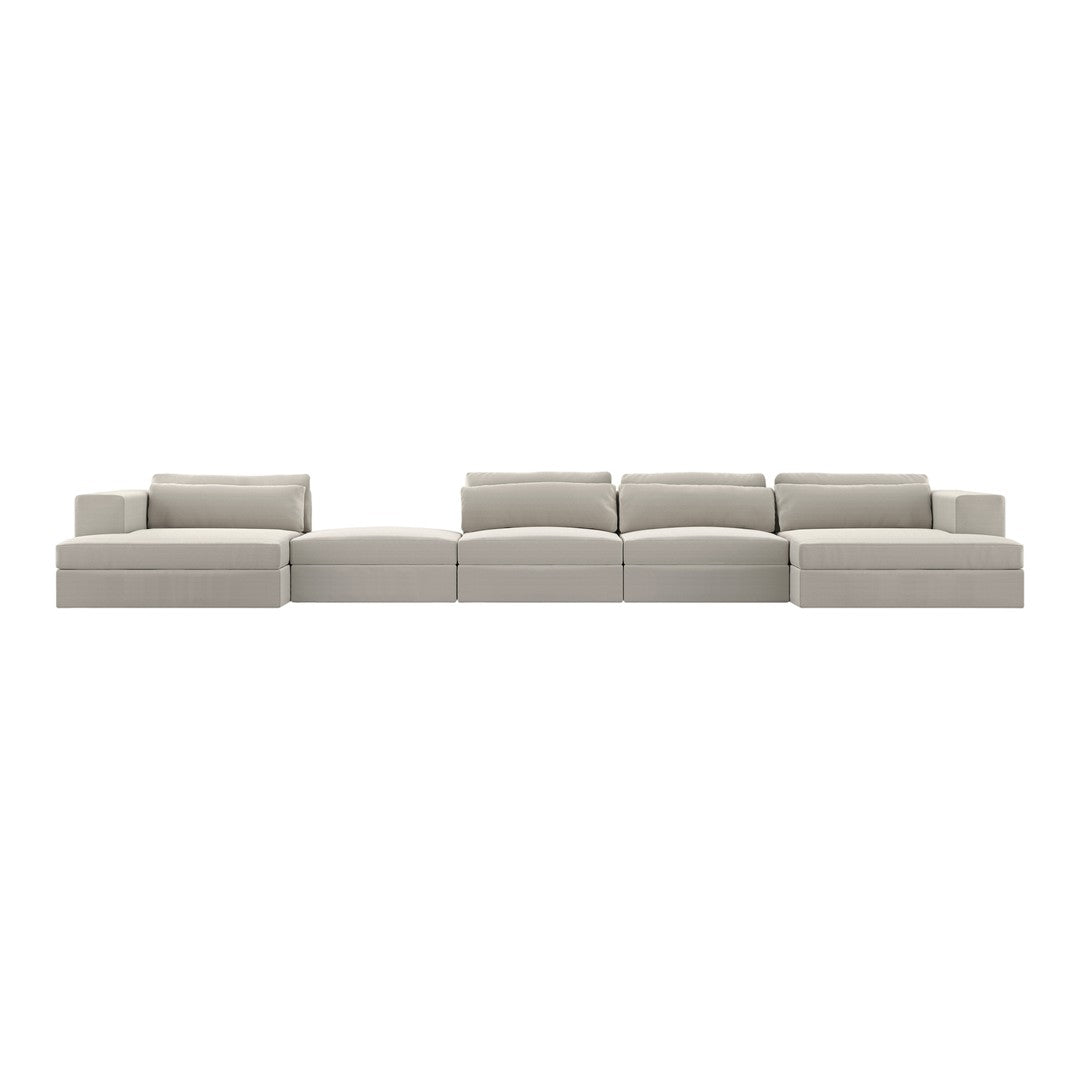 Light gray modular sofa with a smooth, modern design, featuring clean lines and no visible patterns.