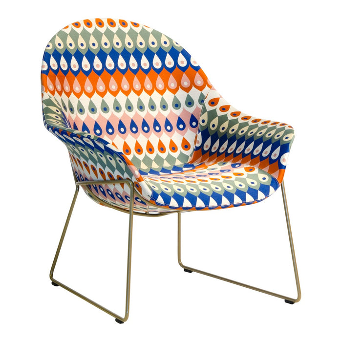 Colorful patterned chair featuring orange, blue, green, and cream teardrop designs on a modern frame.