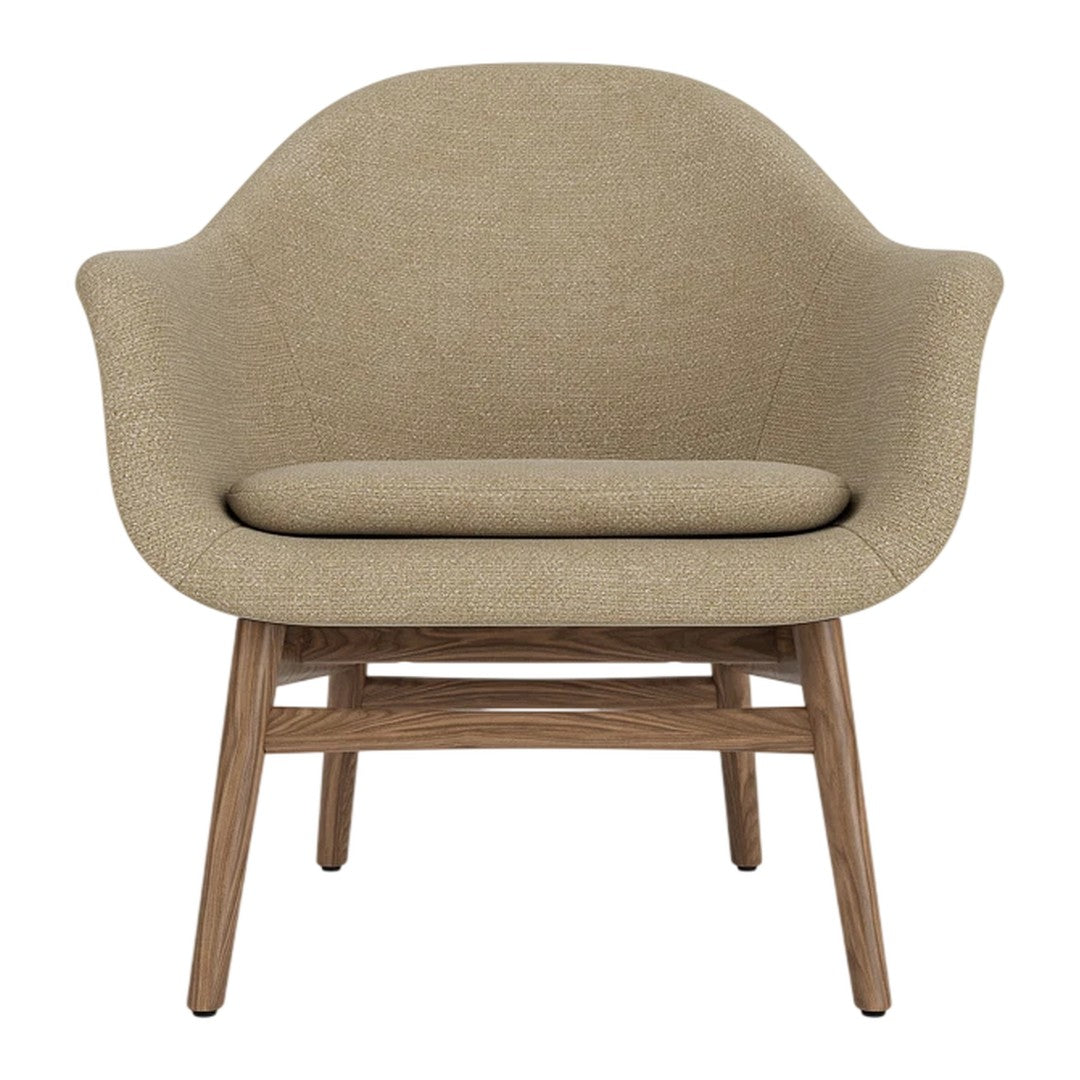 Light beige upholstered chair with a smooth, curved design and wooden legs for a modern touch.