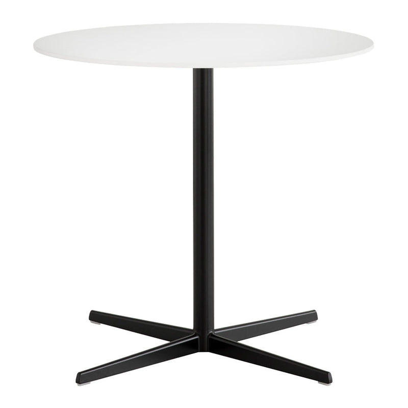 Round white tabletop with a sleek black base and minimalist design, perfect for modern spaces.