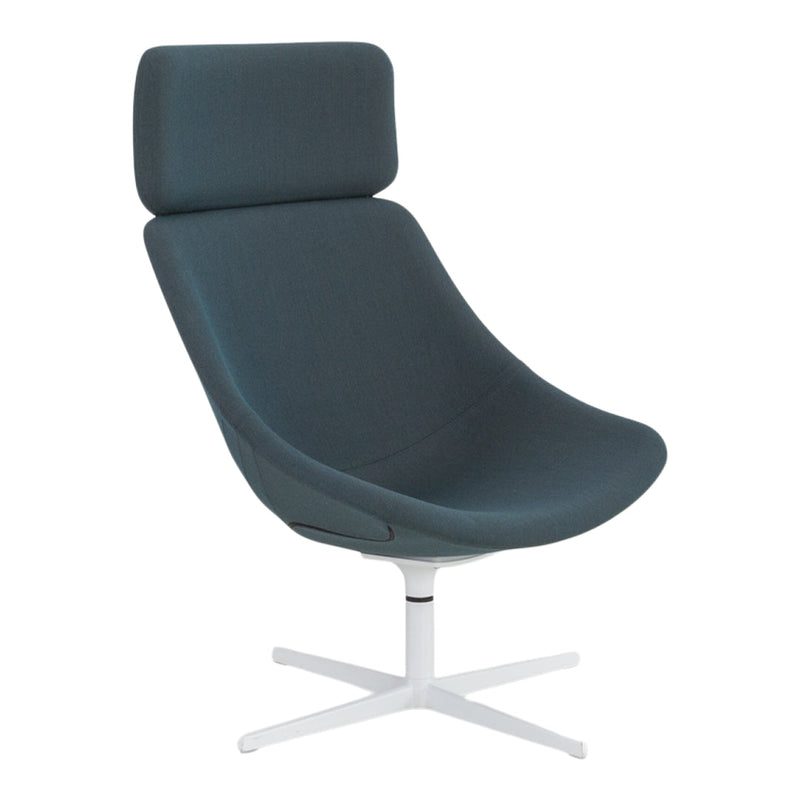 "Stylish teal upholstered chair with a sleek white base and smooth, modern lines."