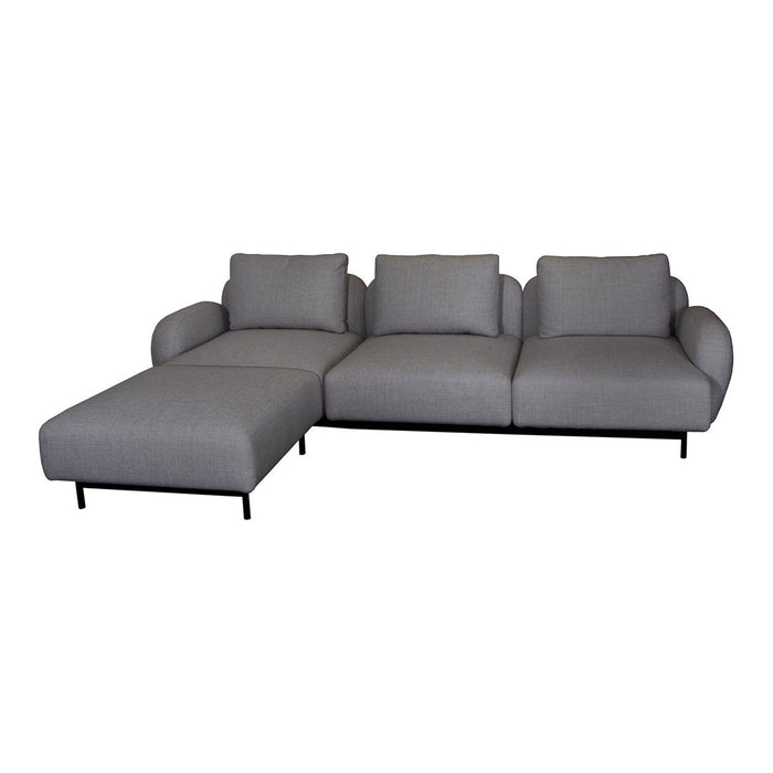 Gray upholstered sectional sofa with smooth fabric, modern design, and black metal legs. Ideal for contemporary living spaces.