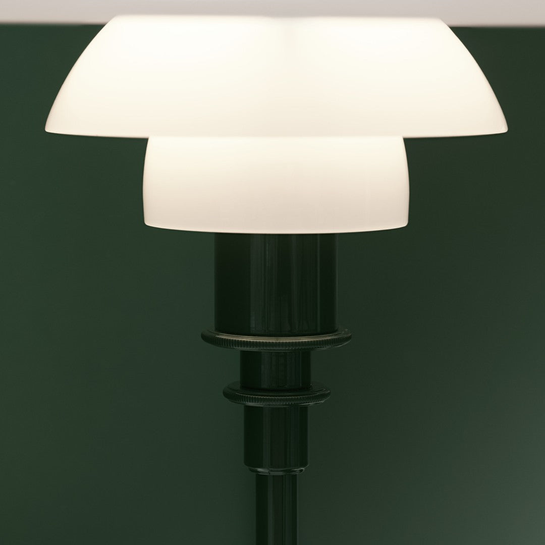 Sleek black lamp base with two white conical shades against a dark green background. Elegant, modern design.