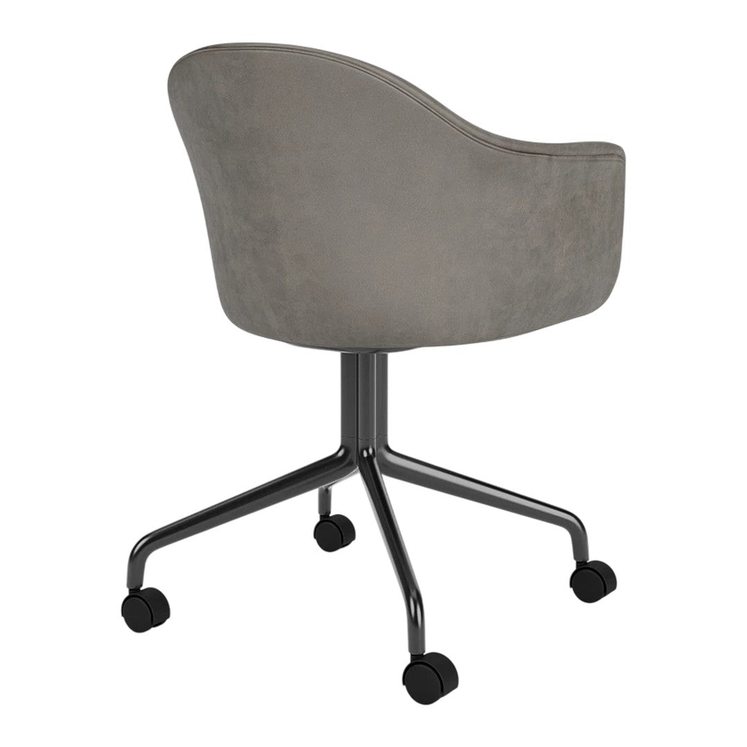 Gray upholstered chair with a sleek design and metal base, featuring a smooth, subtle texture.