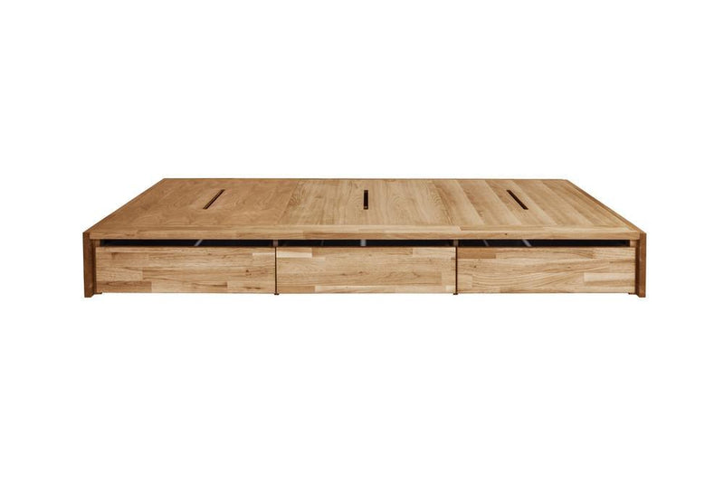 Light wood platform bed with a smooth finish and minimalist design, featuring three drawers and clean lines.