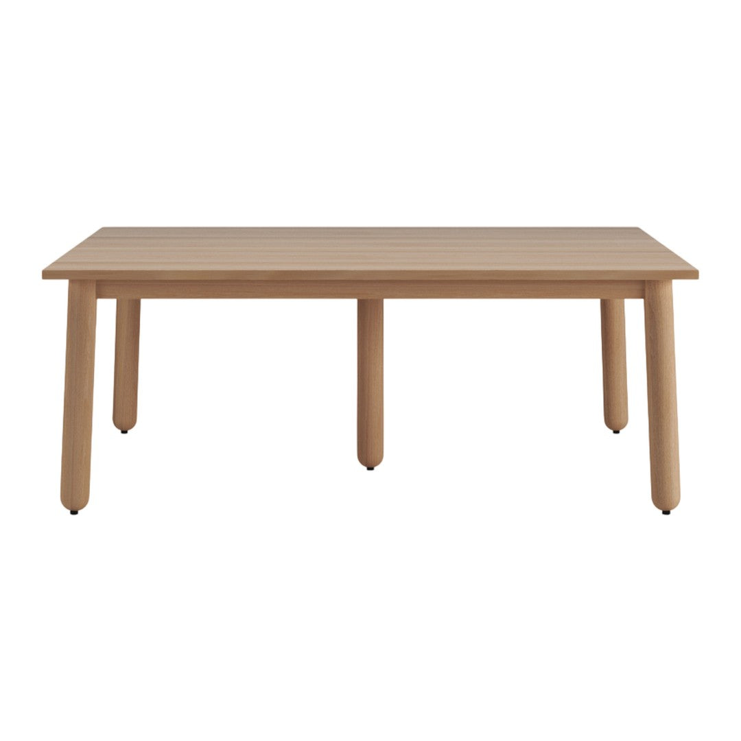 Light wood dining table with a smooth finish and simple, modern design. Perfect for contemporary interiors.