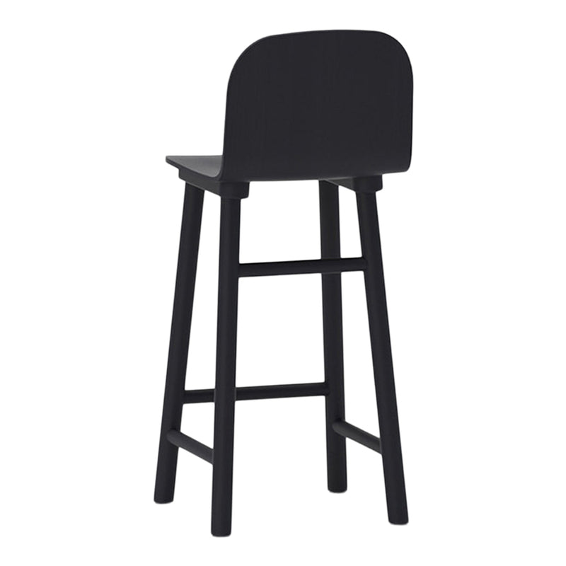 Black wooden bar stool with a minimalist design and smooth matte finish. Perfect for modern interiors.