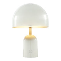 White modern lamp with a sleek dome shade and smooth, rounded base, featuring a warm light glow.