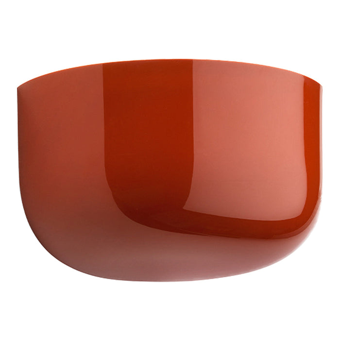 Glossy terracotta bowl with a smooth, rounded shape and vibrant, rich orange hue. Perfect for modern décor.