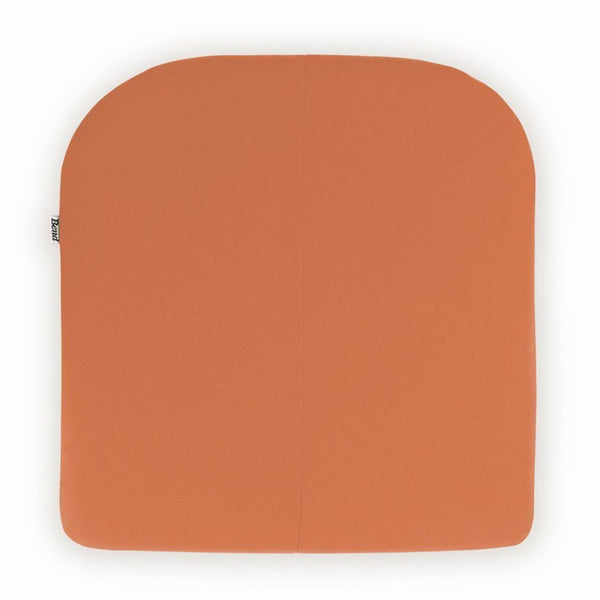 Orange ergonomic cushion with a smooth, rounded design for comfort and style.