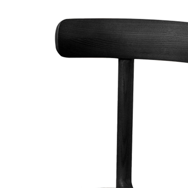 Black wooden chair featuring a smooth finish and sleek, minimalist design. Perfect for modern interiors.