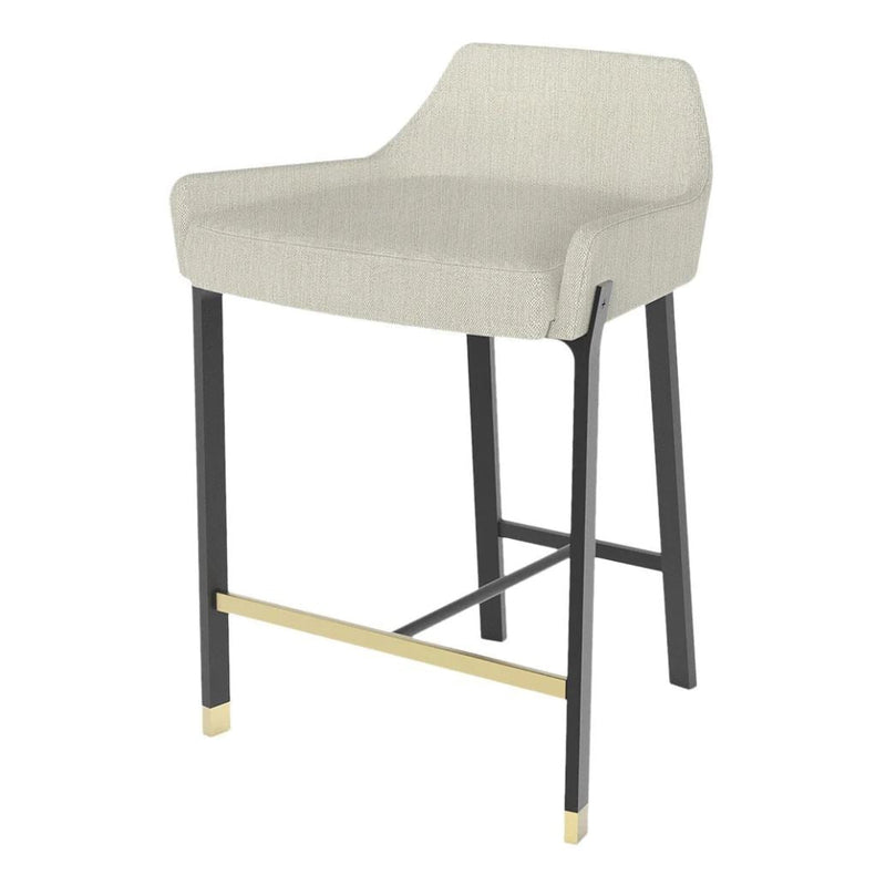 Beige upholstered bar stool with black legs and gold accents, featuring a sleek, modern design.