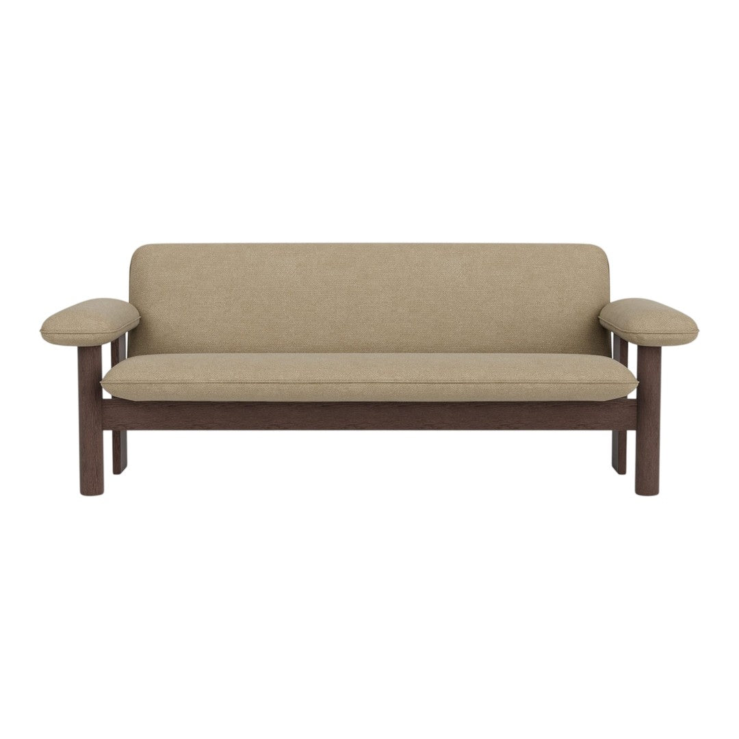 Beige upholstered sofa with a sleek, minimalist design and dark wood armrests for a modern touch.
