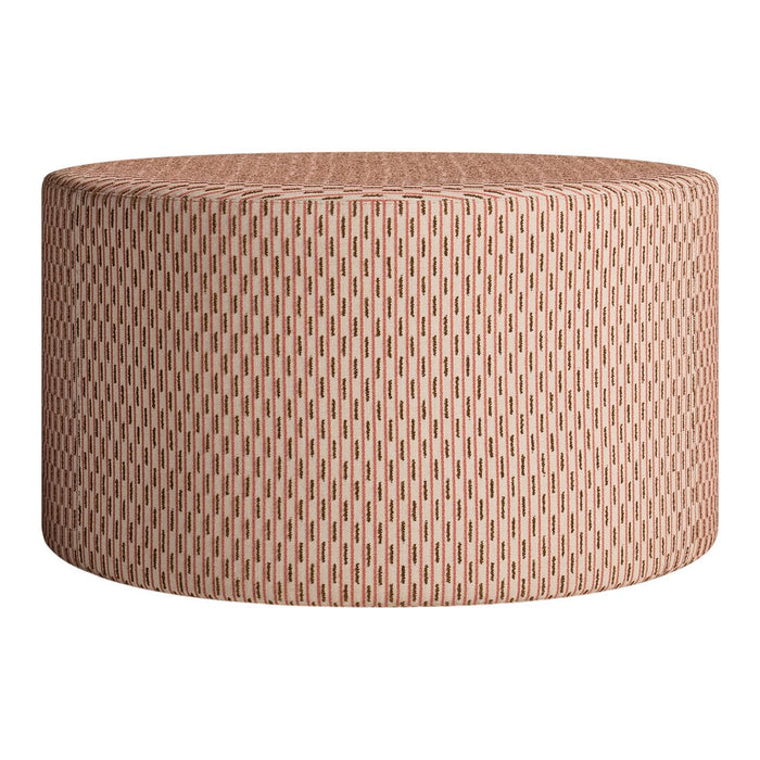 Round ottoman in soft pink with a textured geometric pattern, perfect for modern decor.
