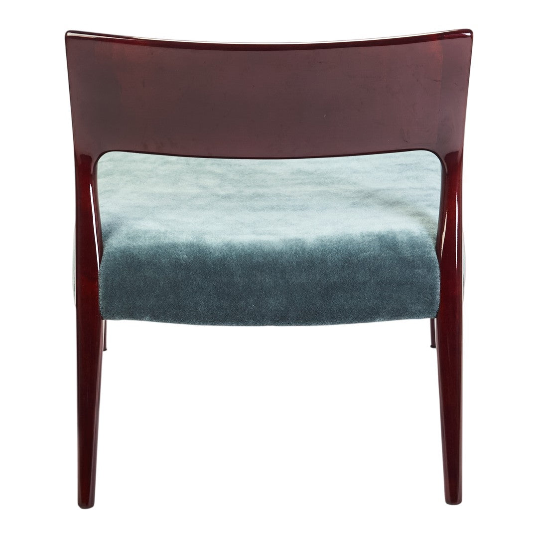 Back view of a chair with a rich mahogany frame and a soft, textured light blue cushion.