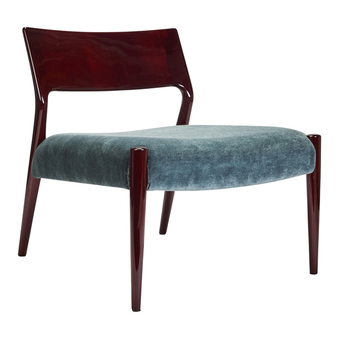 Stylish mid-century chair with a rich mahogany frame and soft, textured blue upholstery.
