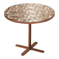 Round table with a geometric pattern featuring browns, creams, and golds on a stylish, smooth surface.