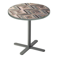 Round table featuring a geometric chevron pattern in soft pinks, grays, and cream on a sleek gray base.