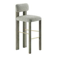 Gray upholstered bar stool with rounded back and golden metal accent. Modern design with a minimalist look.