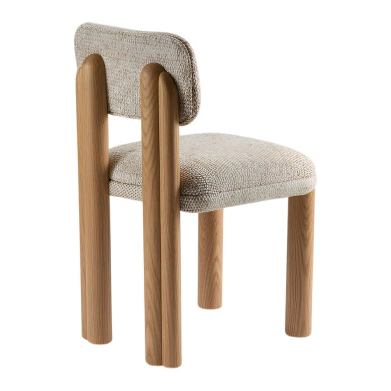 Light beige upholstered chair with rounded wooden legs and a textured, cozy fabric finish.