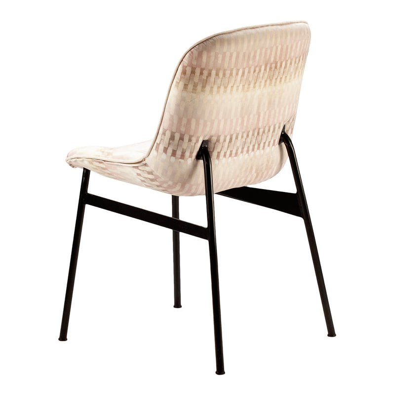 Blush pink and cream patterned chair with black metal legs. Modern design with subtle geometric textures.