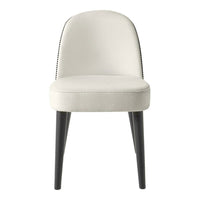 Elegant cream chair with subtle black nailhead trim and sleek black legs, perfect for modern decor.