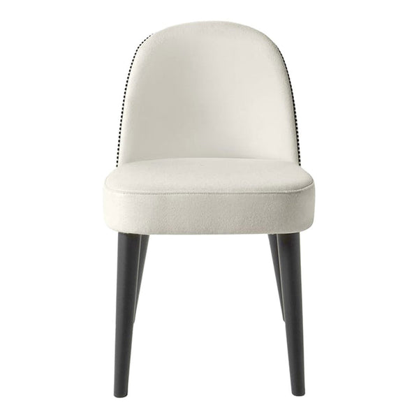 Elegant cream chair with subtle black nailhead trim and sleek black legs, perfect for modern decor.
