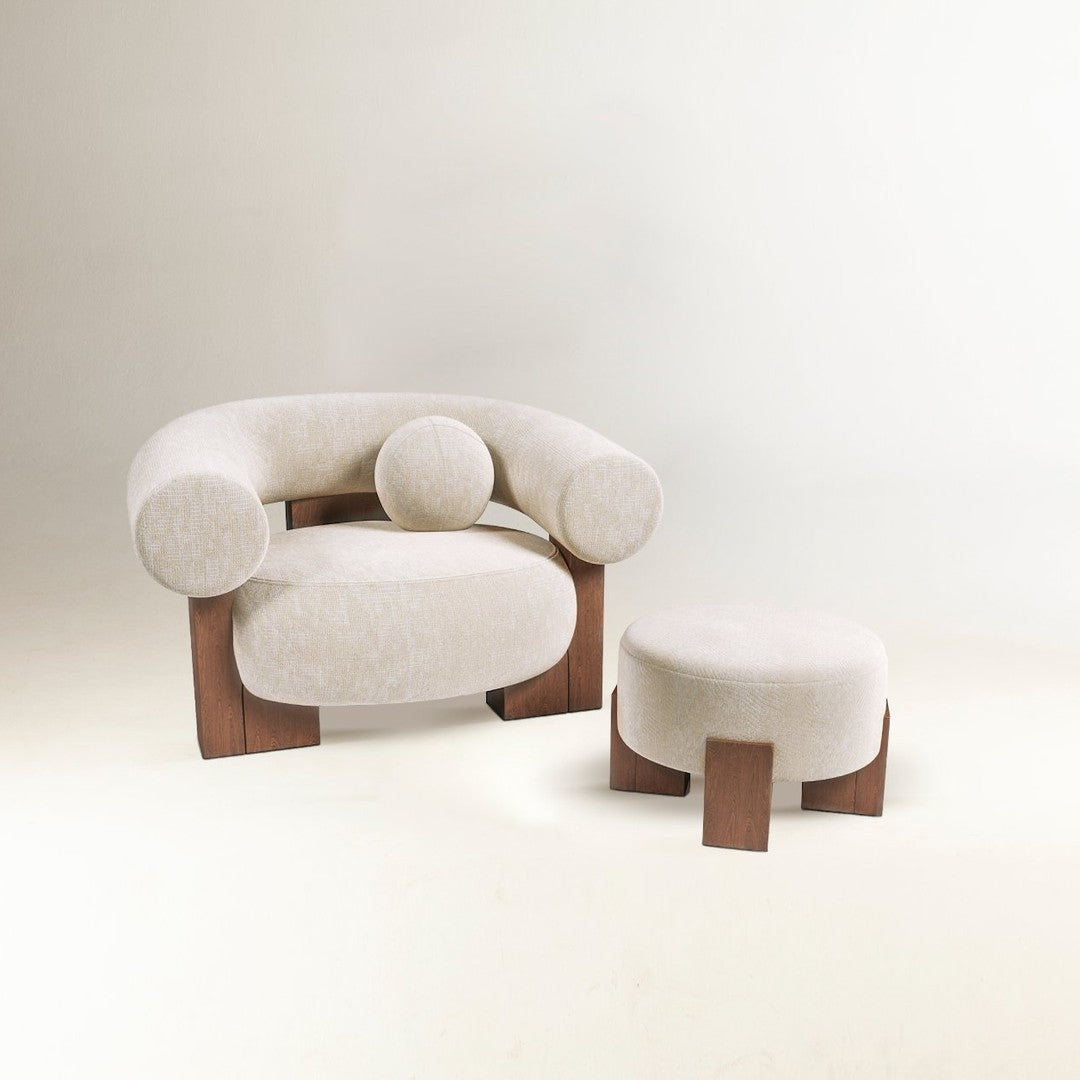 Neutral beige armchair and ottoman with a textured fabric and wooden accents. Minimalist design with rounded shapes.