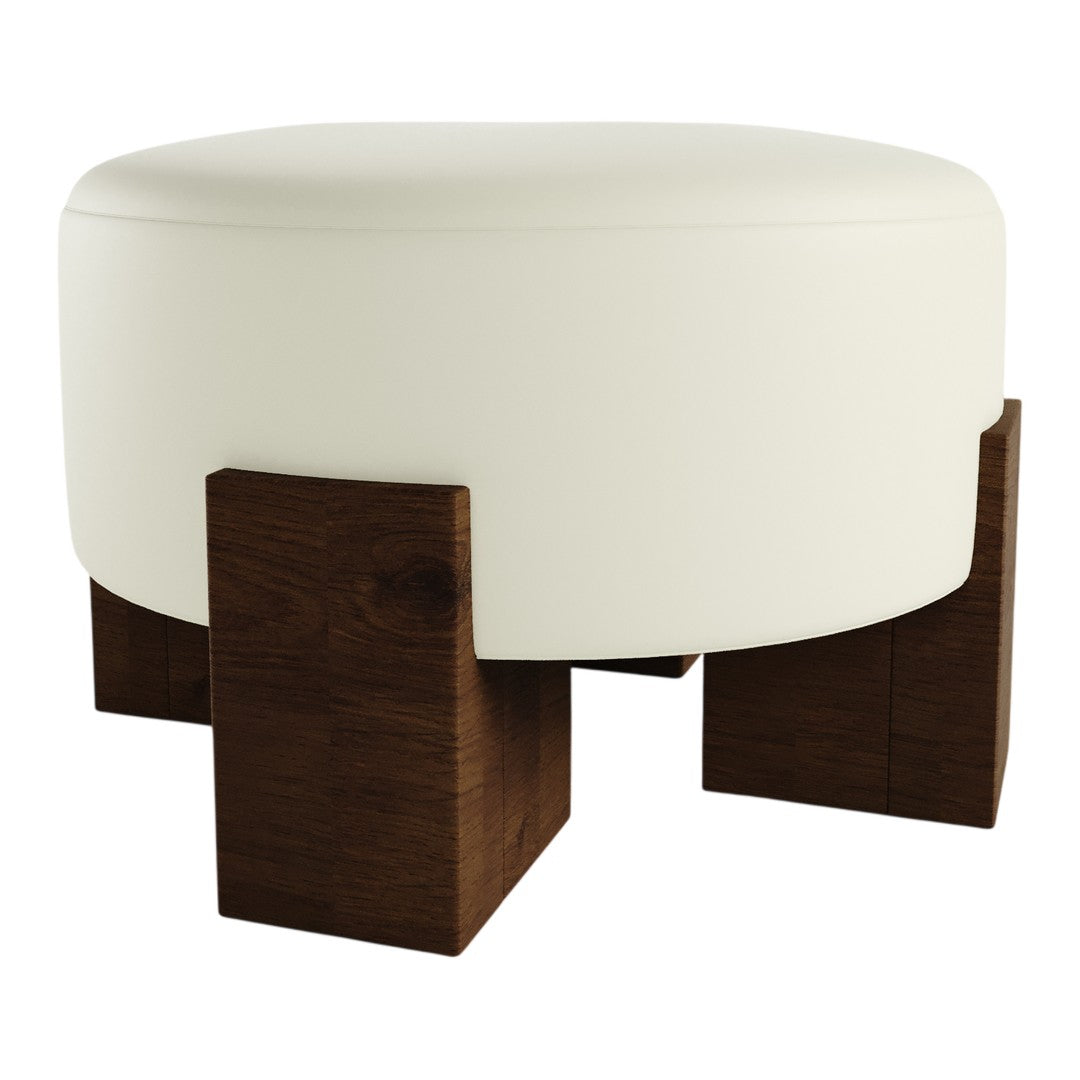 White round ottoman with dark wooden legs, showcasing a sleek and modern design. Perfect for contemporary decor.
