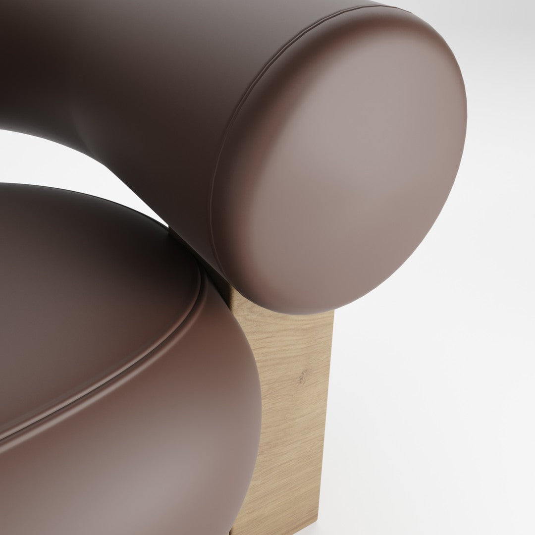 Brown leather upholstery with smooth curves, featuring a wooden base in a natural finish.