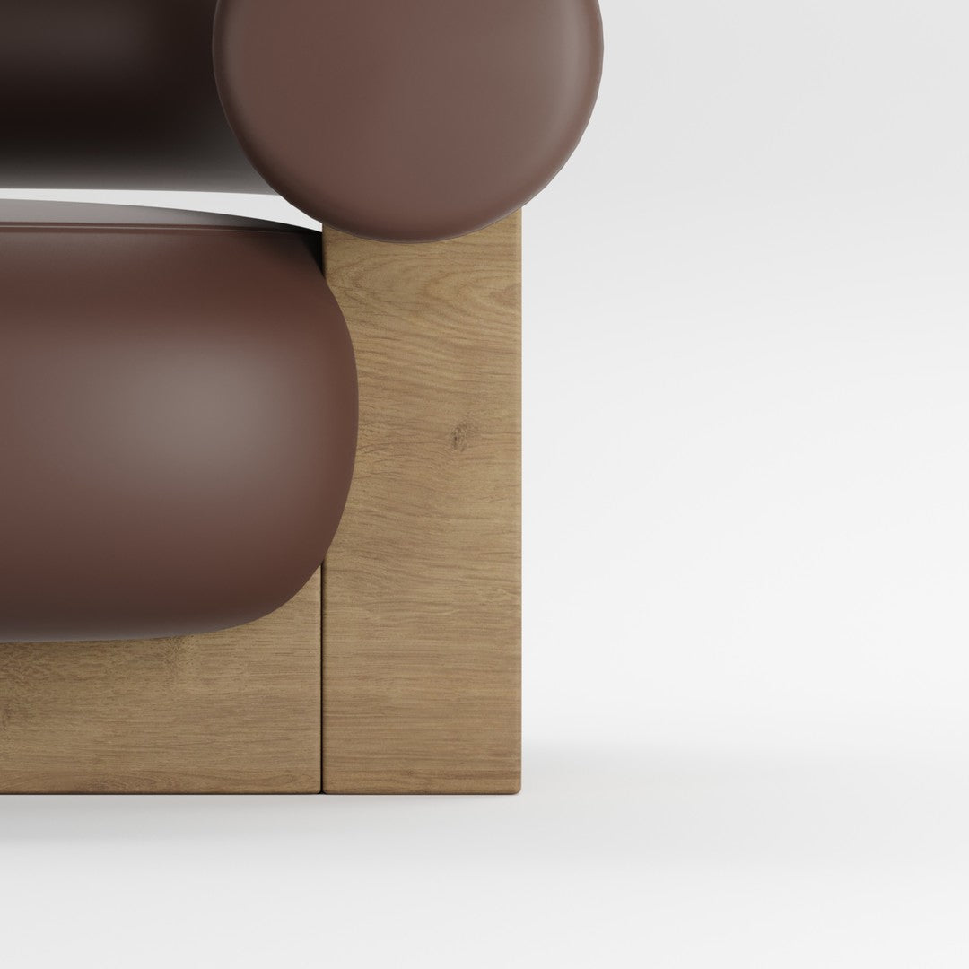 Brown rounded sofa with a natural wooden base, featuring a minimalist design and smooth, glossy textures.
