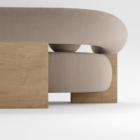 Beige curvy sofa with a wooden base, featuring a smooth texture and minimalist design. Perfect for modern interiors.