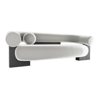 Modern white sofa with smooth, curved lines and contrasting black legs, featuring minimalist design and sleek patterns.
