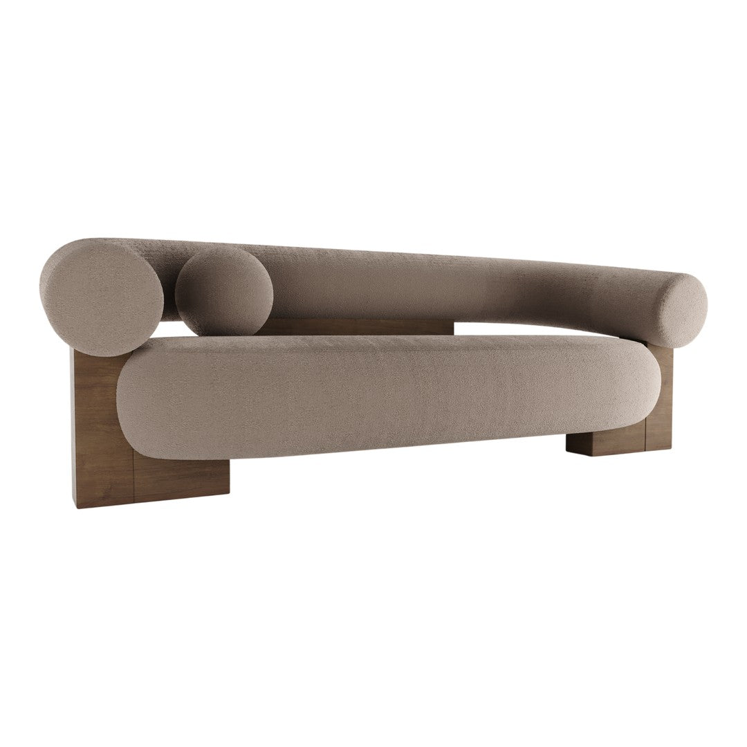Beige sofa with rounded arms and a smooth silhouette, featuring a minimalist design and wooden base.