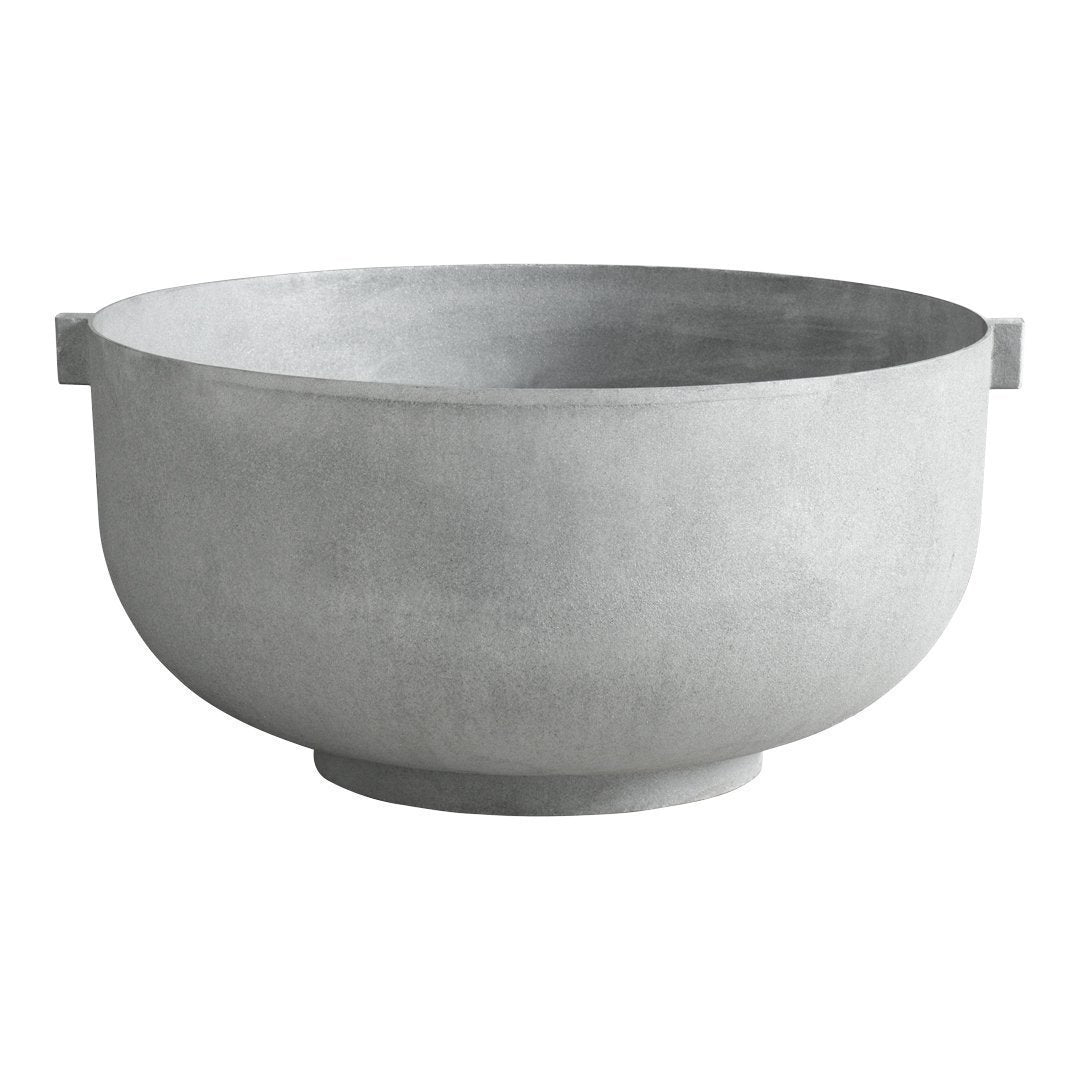 Gray concrete bowl with a smooth, matte finish and minimalist design, perfect for modern decor.