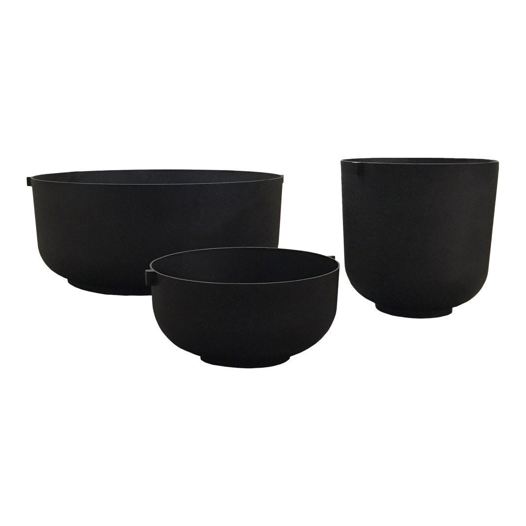 Set of three sleek, matte black bowls with smooth contours and minimalist design. Ideal for modern kitchen styling.