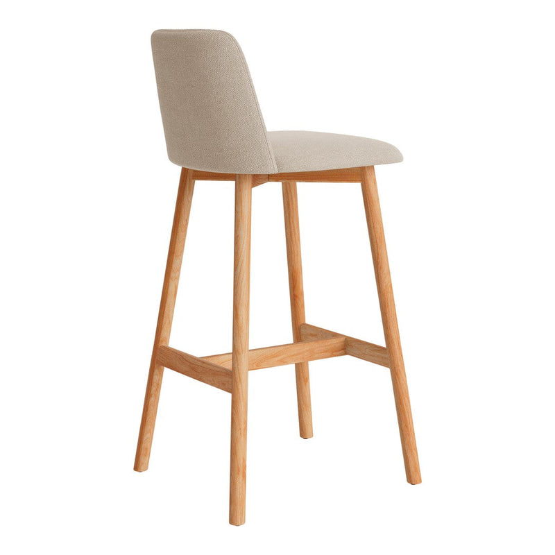 Beige upholstered bar stool with natural wood legs, featuring a minimalist design and smooth texture.