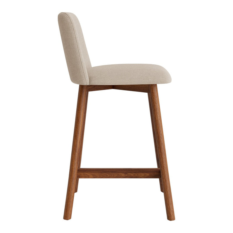 Beige upholstered barstool with natural wood legs, featuring a sleek, minimalist design and clean lines.