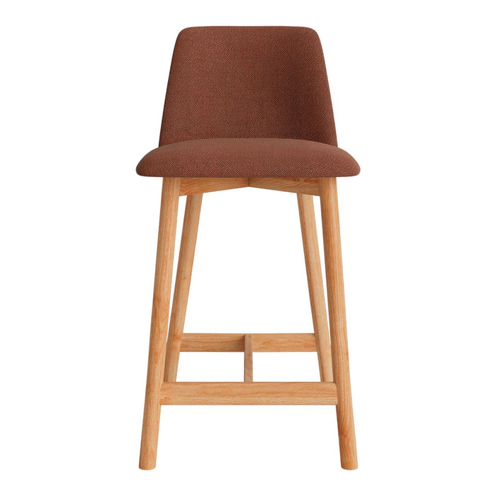 Brown upholstered bar stool with a minimalist design and light wooden legs. Perfect for modern spaces.