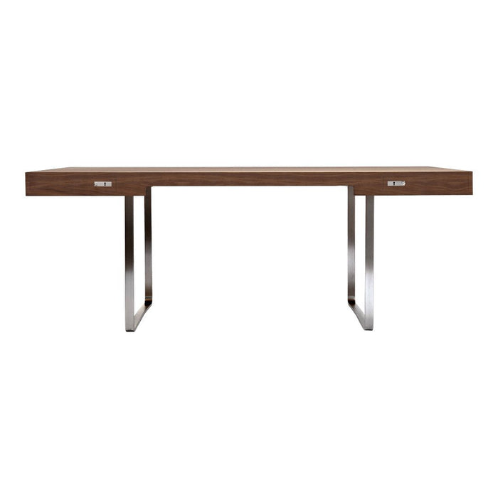 Modern wooden table with a rich brown finish and sleek silver metal legs. Minimalist design with subtle drawer accents.