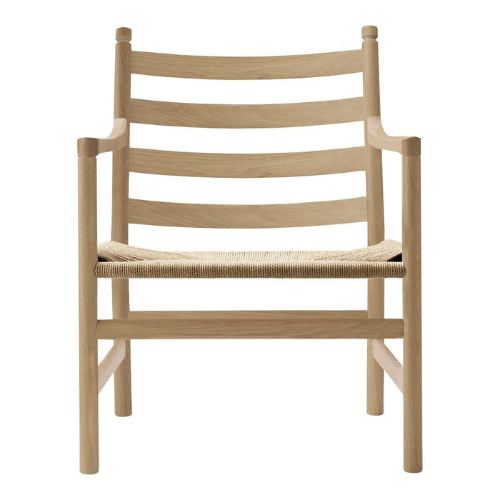Natural oak wood armchair with a simple striped backrest and woven seat, featuring a minimalist design.