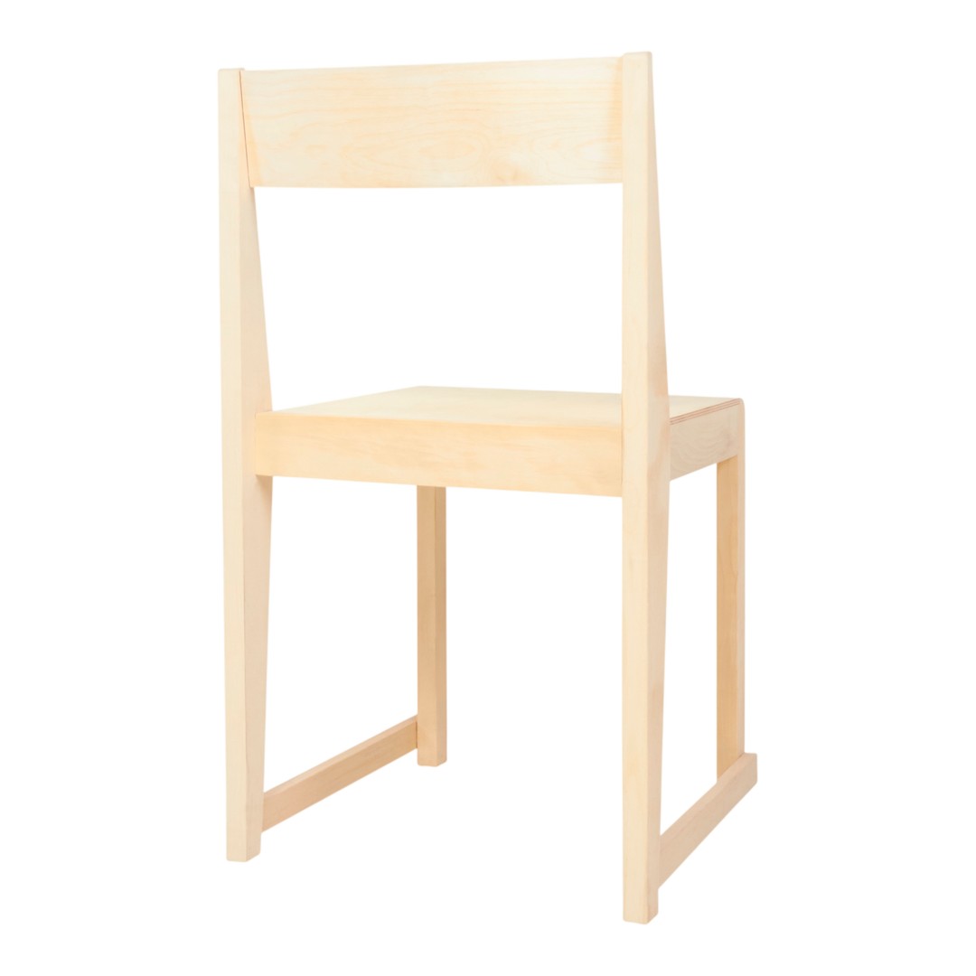 Minimalist wooden chair in natural light wood color, featuring a simple, smooth finish with no visible patterns.