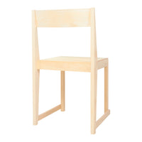 Minimalist wooden chair in natural light wood color, featuring a simple, smooth finish with no visible patterns.