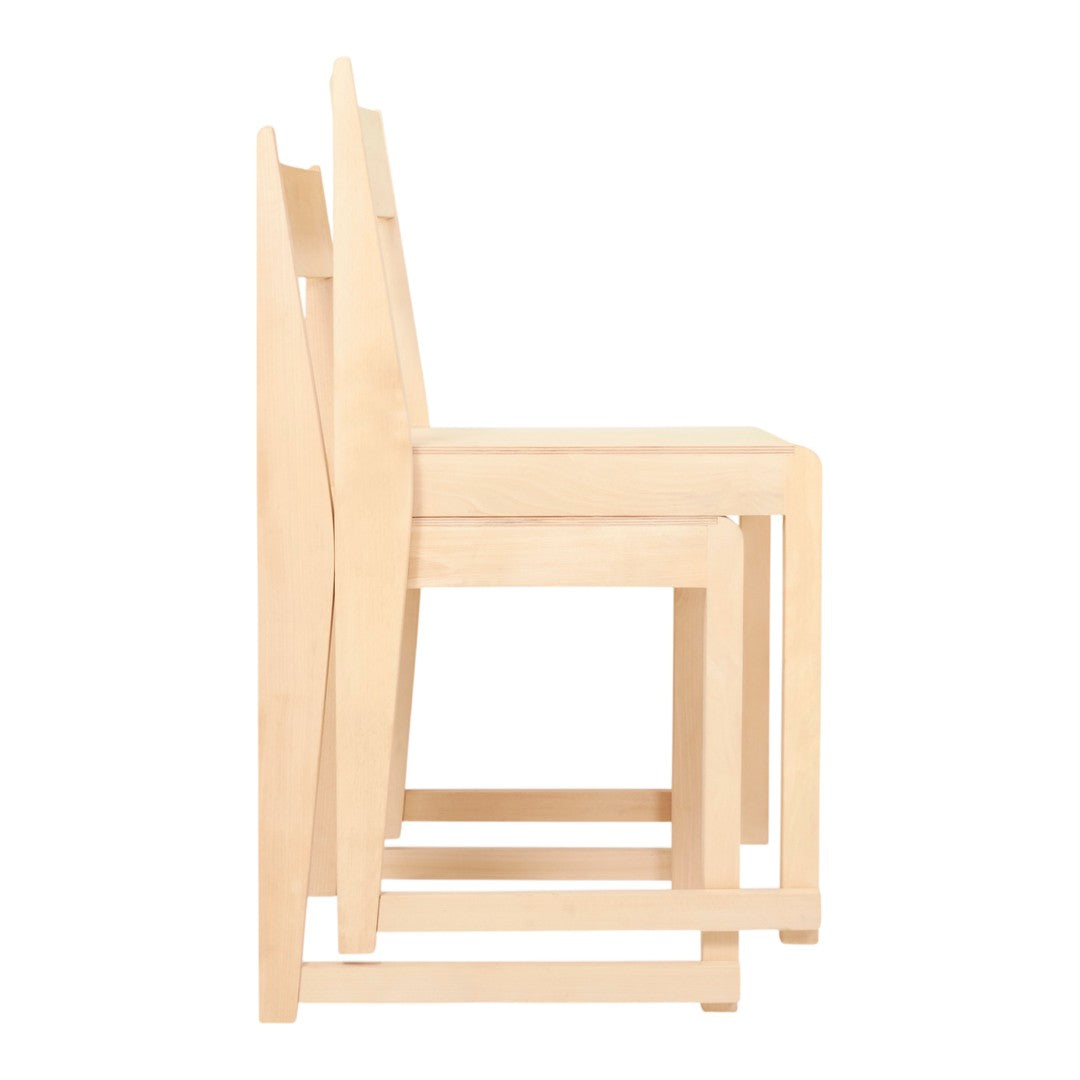 Light wooden chairs in a minimalist design, featuring a simple, smooth finish and a natural color palette.