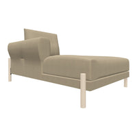 Light beige chaise lounge with a smooth, minimalist design and neutral color palette.