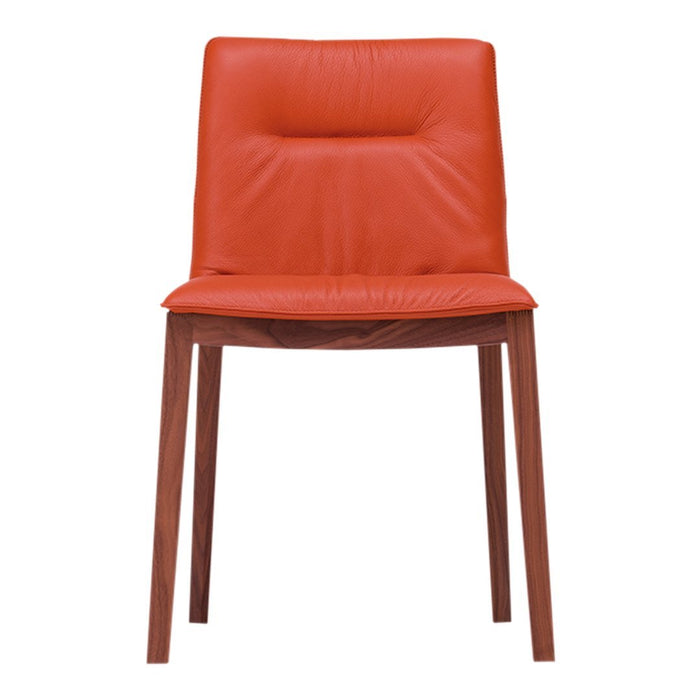 "Vibrant orange upholstered chair with a sleek design and walnut wood legs."