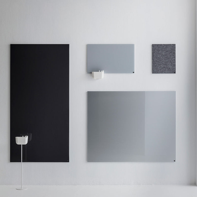 Set of four wall panels in matte black, soft gray, and textured dark gray patterns on a minimalist white background.