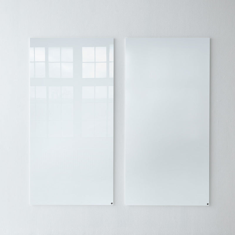 Glossy white wall panels with a sleek, reflective finish, featuring smooth surfaces and minimalistic design.